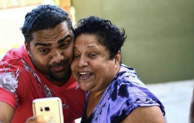 Romeich Major with his mother.